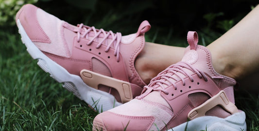 Woman's feet in prink trainers